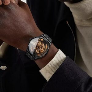 Black and Gold Openwork Watch — view 1